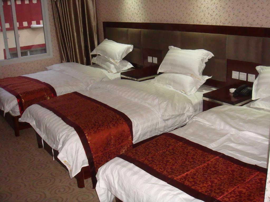 Jiuzhaigou Man Jiang Hong Hotel Дзиуджайгоу Стая снимка